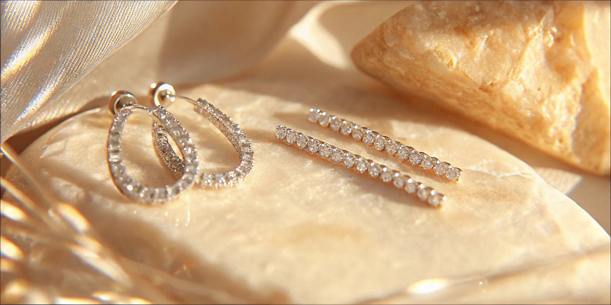 Diamond stud earrings and huggie hoops for everyday wear