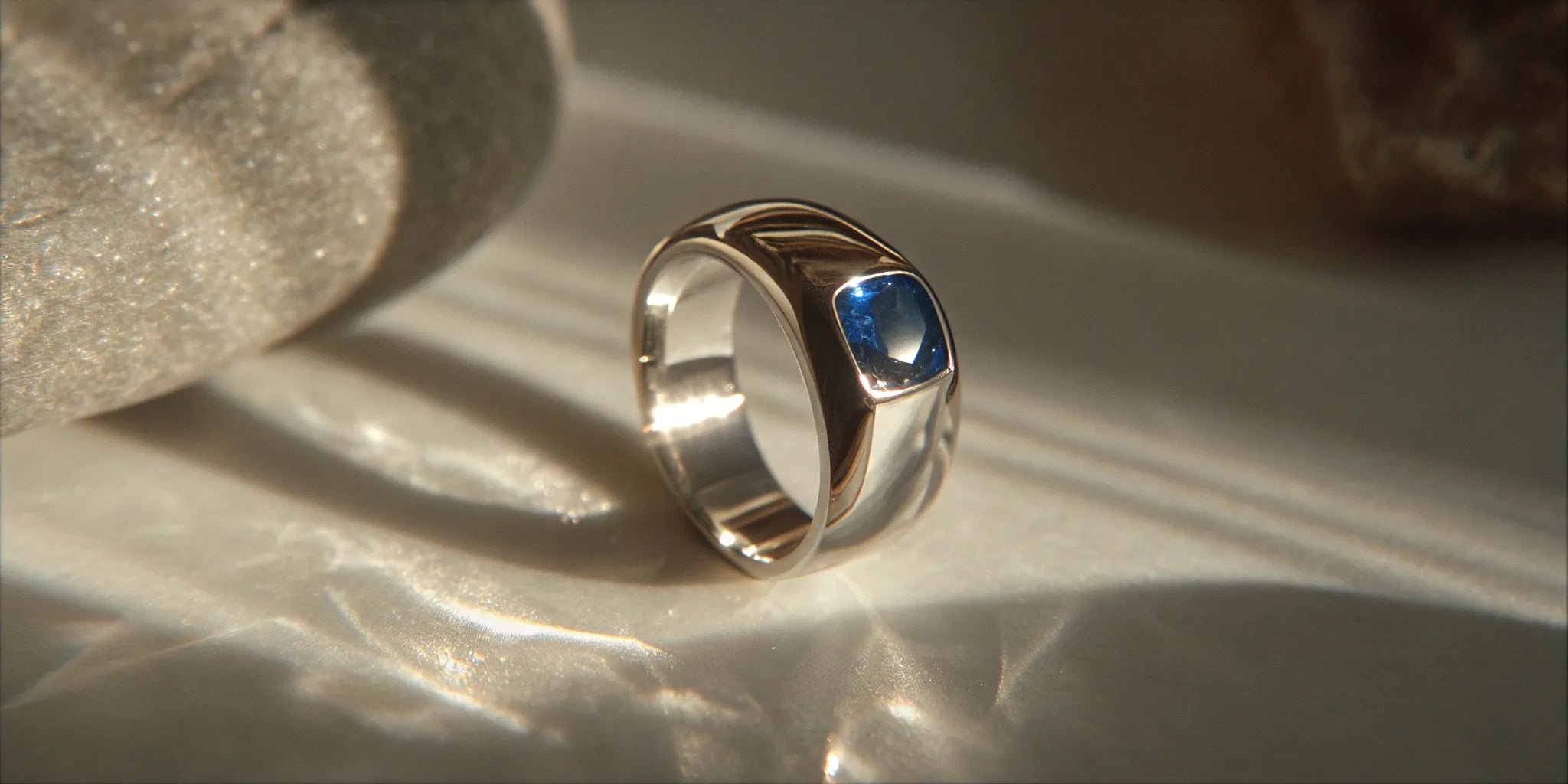 A modern blue sapphire ring for men.