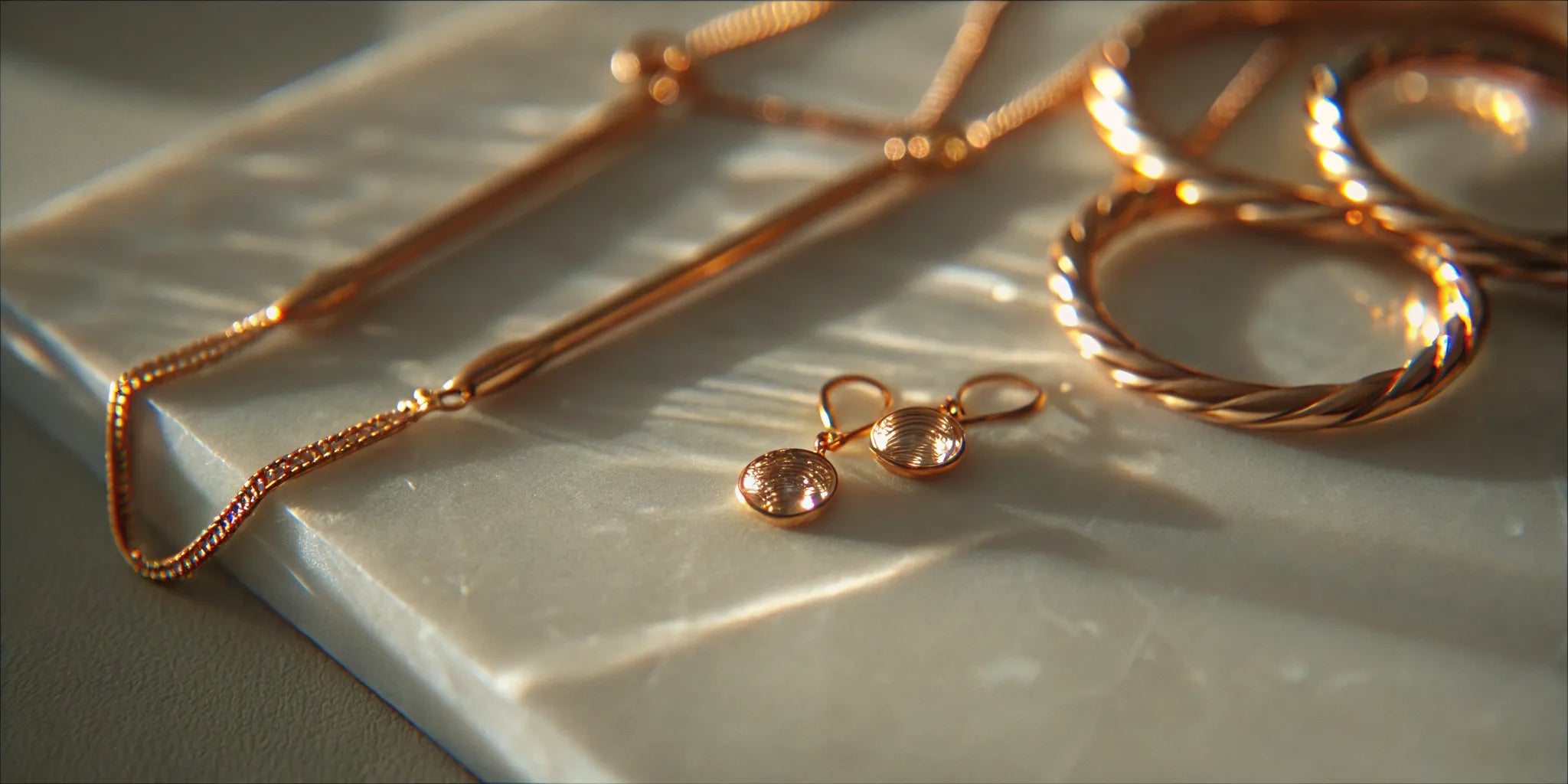 A custom gold lariat necklace with a unique design.
